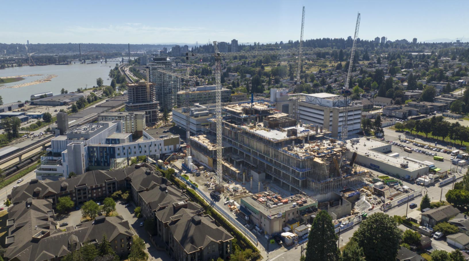 The Royal Columbian Hospital is located overlooking the Fraser River, and it is the oldest hospital in British Columbia. Phase 2 of its redevelopment will establish a 10-storey new acute care tower with 350 beds, a larger emergency department and maternity unit, more operating rooms, 350+ underground parkades, a rooftop heliport, and a new main entrance.
